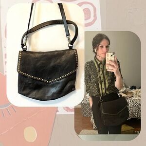 black leather cross body bag with gold studs